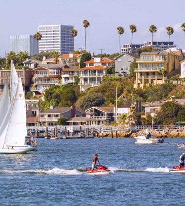 The scenic Entrance Channel offers boats of all types easy access to Newport Harbor and Newport Bay.